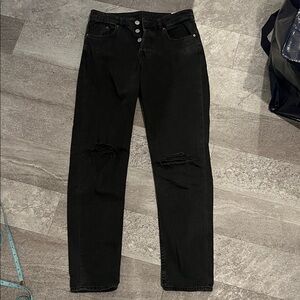 Mid rise black distressed mom jeans